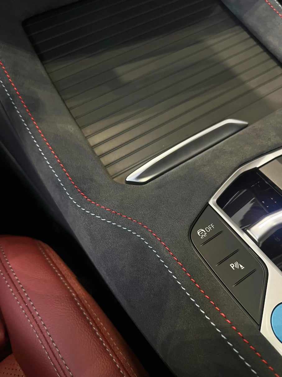 BMW X3 G01 console overlay installed on gear selector area to protect piano black trim from scratches and fingerprints