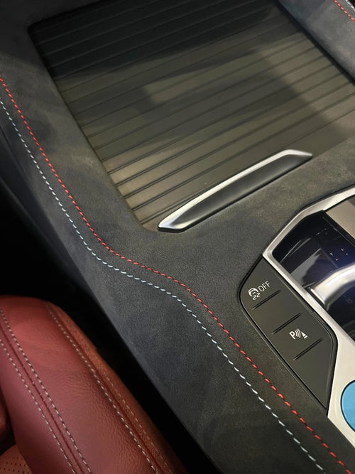 BMW X3 G01 console overlay installed on gear selector area to protect piano black trim from scratches and fingerprints