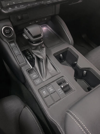 Prado J250 center console trim cover protecting gear selector area from scratches