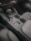 Prado J250 gear selector area leather trim overlay detail on center console