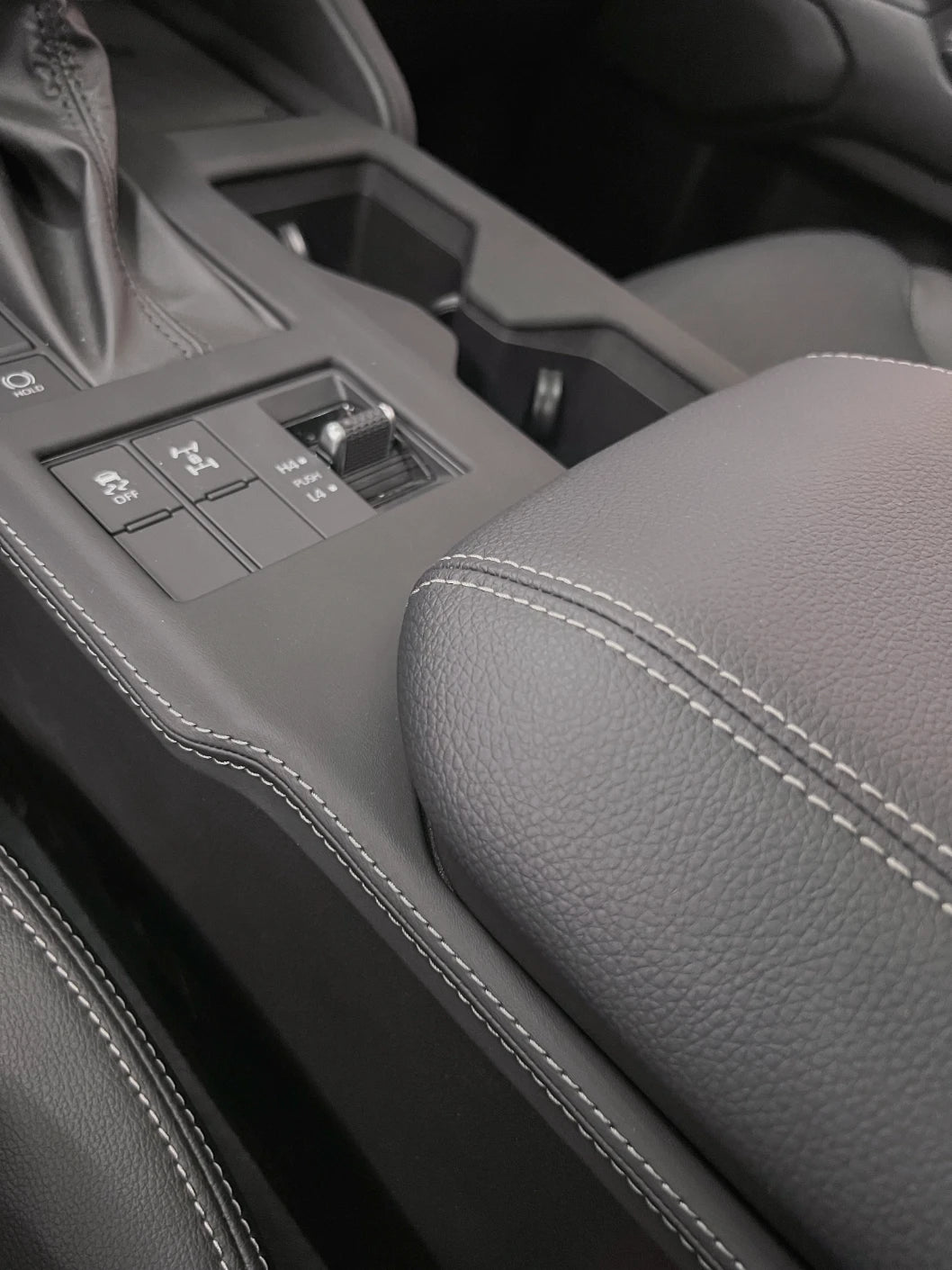 Toyota Prado J250 interior console trim cover installed around gear selector