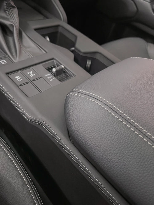 Toyota Prado J250 interior console trim cover installed around gear selector